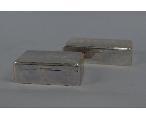 AN ELIZABETH II PLAIN RECTANGULAR CIGARETTE BOX, makers Adie Brothers, Birmingham 1962, length 16.5cm, boxed, together with a