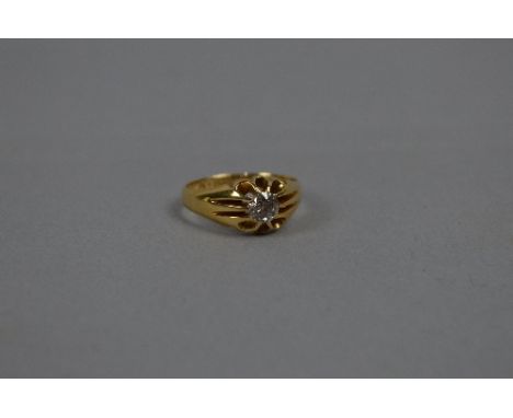 AN EARLY 20TH CENTURY 18CT GOLD SINGLE STONE DIAMOND GYPSY SET RING, estimated old European cut weight 0.60ct, colour assesse