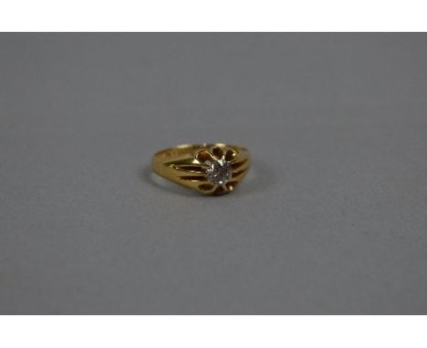 AN EARLY 20TH CENTURY 18CT GOLD SINGLE STONE DIAMOND GYPSY SET RING, estimated old European cut weight 0.60ct, colour assesse