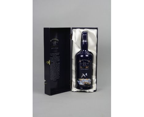 A BOTTLE OF BOWMORE 'BLUE BUCHAN', 22 YEAR OLD ISLAY SINGLE MALT WHISKY, in a ceramic decanter and presentation box, 43%, 70c