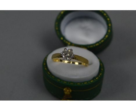 A MODERN DIAMOND SINGLE STONE 18CT RING MOUNT, set with an old European cut diamond estimated weight 0.65ct, colour assessed 