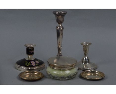 AN ELIZABETH II SILVER AND BLACK ENAMEL DWARF CANDLESTICK, decorated with dog roses, maker Adie Brothers, Birmingham 1960, he