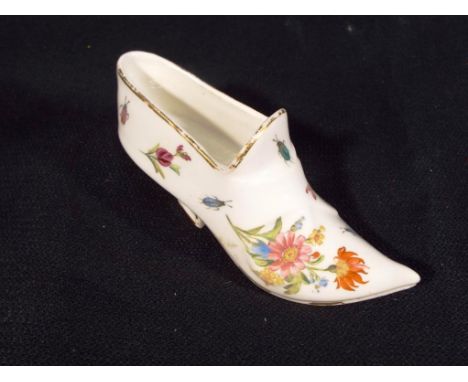 Royal Worcester - a 19th century ornamental depiction of a lady's shoe / slipper hand-painted in a floral design, 6 cm (high)