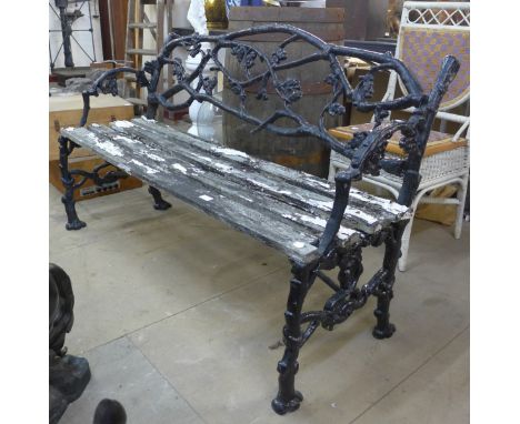 A Victorian Coalbrookdale style cast iron garden bench 