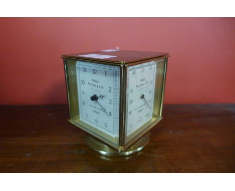 A Sewills of Liverpool brass four dial desk timepiece, comprising; clock, thermometer, barometer and hygrometer, 11cms h 