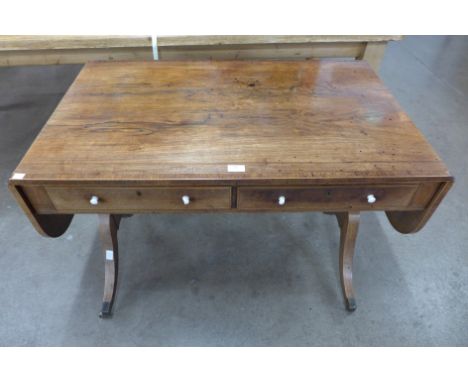 A Regency inlaid rosewood sofa table. This lot is offered for sale with non-transferable standard ivory exemption declaration