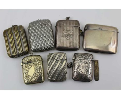 THREE SILVER VESTA CASES to include a Chester 1912 example, with engine turned decoration, one plain example and one with aca