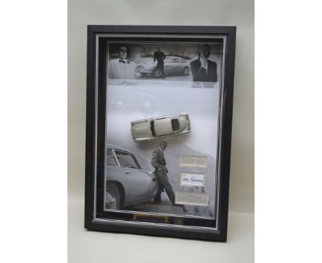 A "SEAN CONNERY JAMES BOND 007" DISPLAY CASE, containing Sean Connery's certified autograph, and a model of a silver Aston Ma