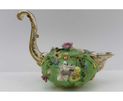 AN EARLY 19TH CENTURY DERBY LIDDED CERAMIC JUG, of squat floral encrusted form, with cover having a rose finial, the upstand 