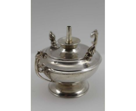A LATE VICTORIAN SILVER TABLE LIGHTER of lantern form, having acanthus leaf scroll handles, 7cm high, London 1899 