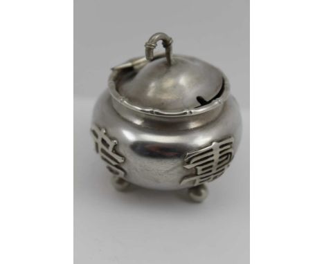 LUEN WO OF SHANGHAI A CHINESE EXPORT SILVER INKWELL / CONDIMENT, with hinged cover, bears character decoration, on four ball 