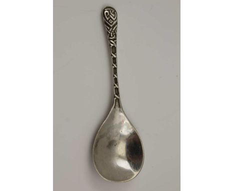 ROBERT ALLISON A SILVER CADDY SPOON, the handle cast with Celtic decoration, the reverse of the bowl hammered, Glasgow 1950, 