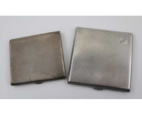 E.J. TREVITT &amp; SONS A SILVER CIGARETTE CASE, Birmingham 1946, engine turned with gilded interior, together with another S