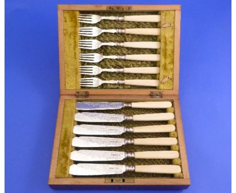 A cased set of six silver and bone handled Fish Servers, by George Harry Whitaker, hallmarked 1898, the prongs and blades wit