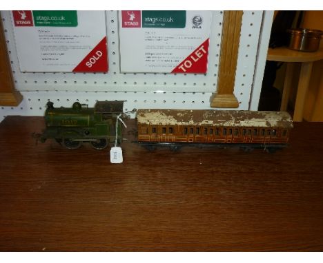 Carette for Bassett-Lowke, an '0' gauge clockwork Peckett 0-4-0ST tank engine, 1017, green, and a Bassett-Lowke 3rd LNER Brak