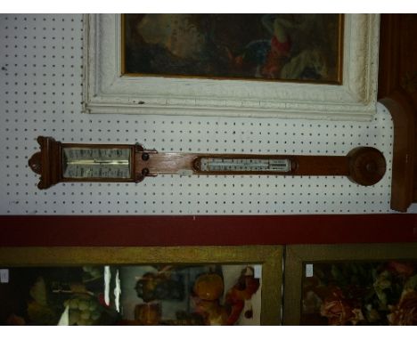 A Victorian carved oak stick Barometer, signed Pickard & Curry, Bristol, the concealed tube with white registration plates an