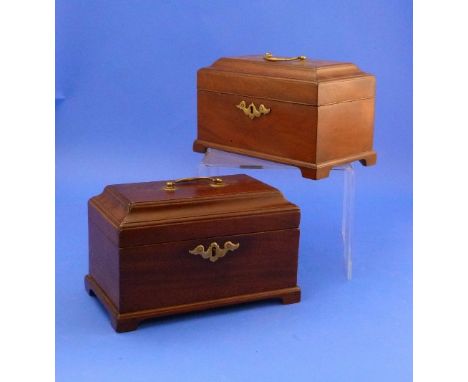 A pair of 19thC mahogany Tea Caddies, each with a brass escutcheon and swing handle on lid, opening to reveal three compartme