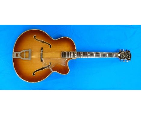 A 1968 Hofner Committee Guitar, with spruce top, birds eye maple back and sides, the 23 fret ebony finger board with ornate m