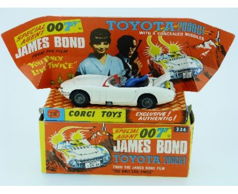 Corgi No.336 "James Bond" Toyota 2000 GT, white, black interior with "Aki & James Bond" figures, wire wheels, red plastic aer