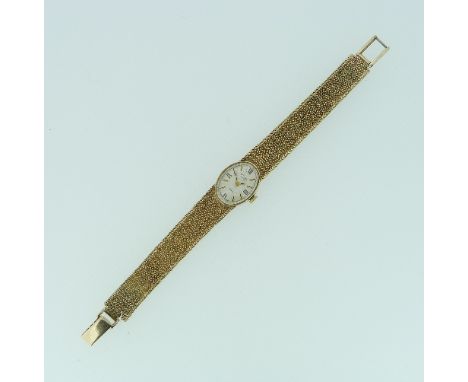 A Rotary 9ct gold lady's wristwatch, with oval dial and integral 9ct gold woven bracelet, bracelet damaged. 