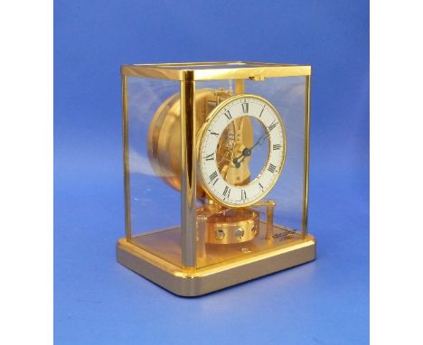 A Jaeger-LeCoultre "Atmos" Clock, model 540, with a 4½in white-enamelled Roman dial with moon hands, Swiss 13-jewels movement