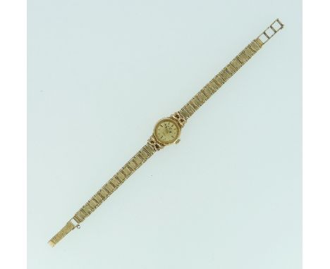A Rotary 9ct gold lady's wristwatch, with Swiss 21-jewels movement and circular dial on a 9ct gold textured link bracelet, wi