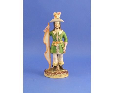 A Staffordshire Pottery figure of an Archer, probably William Tell, wearing plumed hat and holding a bow, decorated in colour