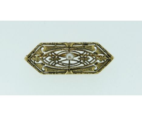A small gilt metal open work Plaque Brooch, set in the centre with cultured pearl.