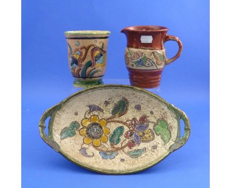 A Honiton Pottery rough textured two-handled oval Dish, with sgraffito decoration, Jacobean flowers with lattice pattern, mar