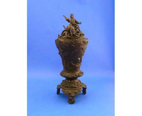 A late 19thC Japanese bronze 'Octopus' Vase and cover, of conical form, the body modelled in relief with octopodes and fish a