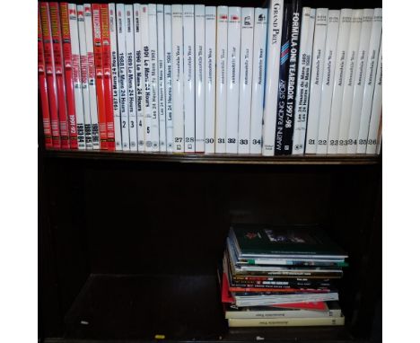 A group of Automobile Year and other Automobilia books, Rally Course annuals, etc. (1½ shelves)