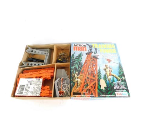 A Palitoy Action Man training tower, with escape slide and crane, boxed. 
