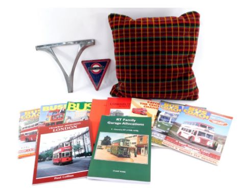 A group of London Transport wares, to include London Transport enamel badge, buses magazines, and a red chequered bus seat cu