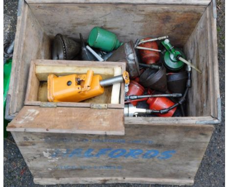 Various tools, including oil cans, funnels, a jack, grease guns, etc. (1 box)