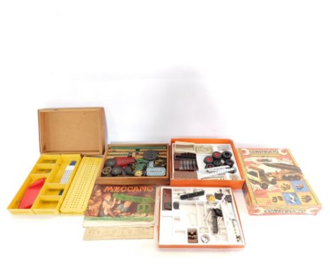 A group of Meccano and Constructo, a Meccano outfit number 4 with instruction manual in wooden box, yellow loose Meccano box,