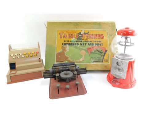 A Bengal 1950's table tennis vintage game, a child's typewriter, plastic Casden number 909142 till, and a bubble gum machine,