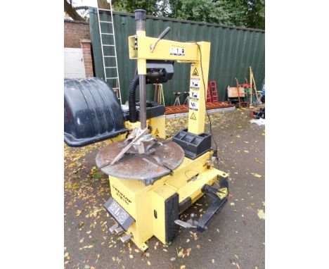 A Dunlop tyre changing machine. 