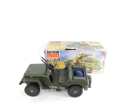 A Palitoy Action Man armored Jeep, boxed. 