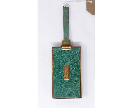 A 1940's/50's weighty brass and green enamelled (shagreen effect) compact, monogrammed to front of case 'Mae', interior: beve