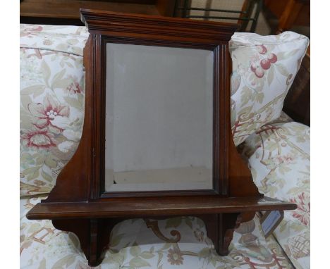 An Edwardian mahogany mirror with shelf and bevelled plate, H.67 W.60 D.15cm 