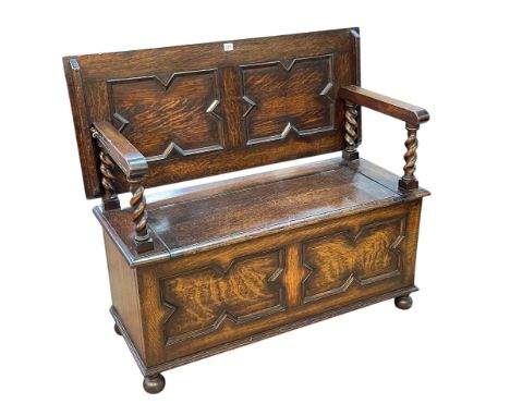 Jacobean style oak Monks bench, 78cm by 107cm by 45cm (closed).