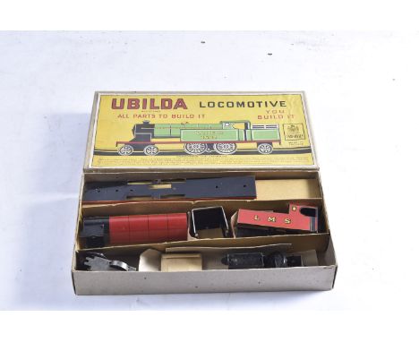 A Boxed Chad Valley 'Ubilda' 4-4-2 Tank Locomotive, in original kit form the locomotive in LMS crimson as no 17841, appears n