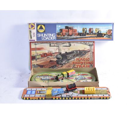 Shunting Train Sets by Brimtoy and Einfalt (Technofix), a 'Magic Shunting Train' No 275 by Brimtoy with embossed tinplate tra