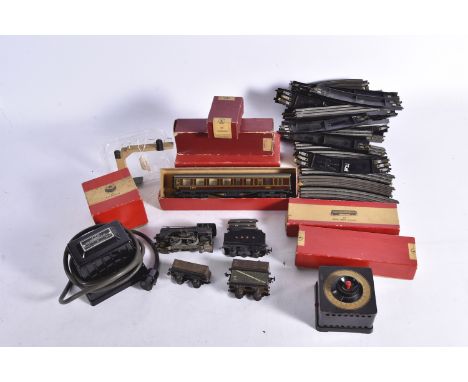 Trix Train Set and Accessories LMS Dining Car, LMS Brake 3rd, Bogie Brick Wagon, Bogie Bolster wagon and Tarpaulin Truck, all