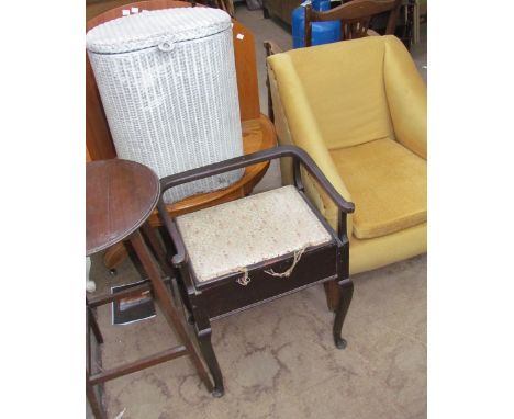 A piano stool together with an upholstered chair, a loom laundry basket and an occasional table