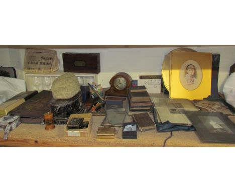 An inlaid mantle clock together with a lacquered tin wig box and wig, photographs, drinking glasses, trouser press, pictures 