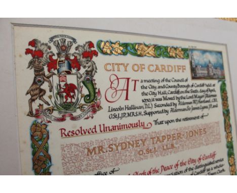 A City of Cardiff illuminated manuscript Presented to Mr Sydney Tapper-Jones O.St.J. LLB., in a red leather volume with gildi