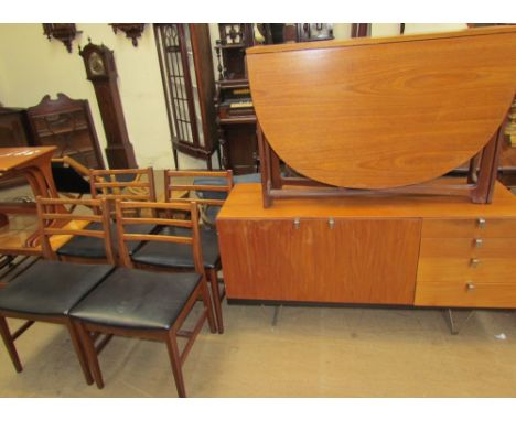 A teak gate leg dining table together with a set of four dining chairs and a sideboard to a design by John &amp; Sylvia Reid