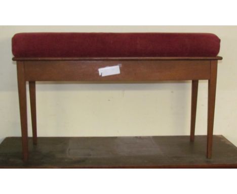 A duet stool on square tapering legs