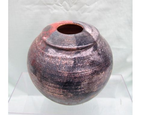 A studio pottery vase in pinks and greys, indistinctly signed, 21cm high